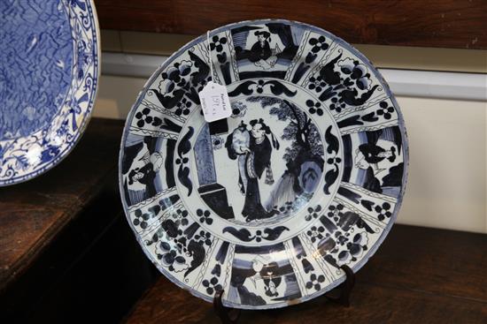 Two Dutch Delft blue and white chargers, c.1690-1700, 34cm and 39.5cm, some damage